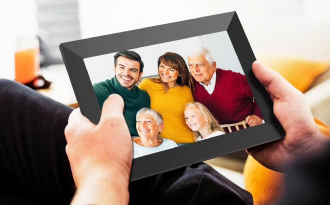 A Person Holding a Uhale Digital Picture Frame