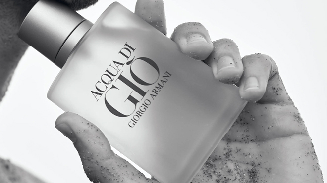 A Person Holding a bottle of Giorgio Armani Acqua di Gio Eau de Toilette Spray