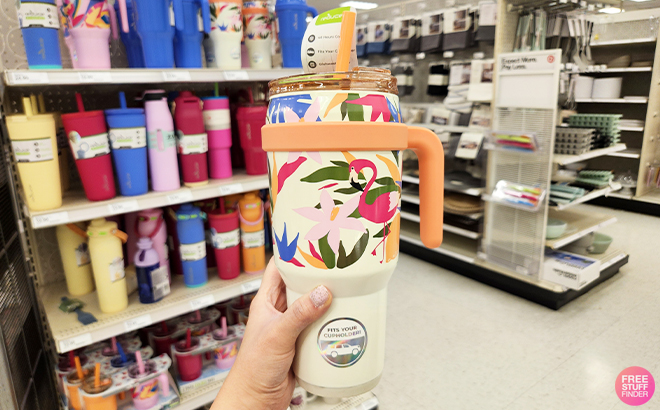 A Person Holding the Reduce 40 Ounce Stainless Steel Straw Tumbler Mug at Target