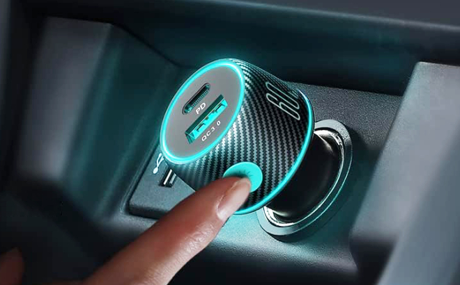 A Person Turning On a USB C 2 Port Fast Car Charger