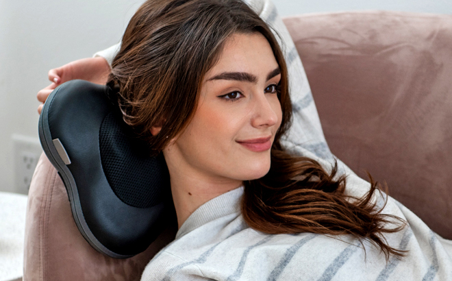 A Person Using a Shiatsu Back and Neck Massager