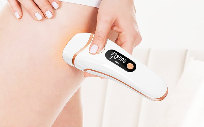 A Person Using an IPL Laser Hair Remover