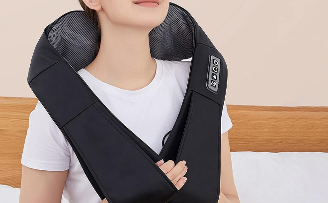 A Person Using the Shiatsu Back and Neck Heat Massager