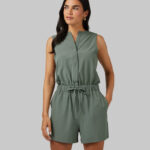 A Person Wearing 32 Degrees Womens Flyweight Woven Romper in Castor Grey Color