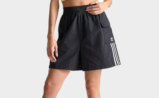 A Person Wearing Adidas Adicolor Cargo Lifestyle Shorts