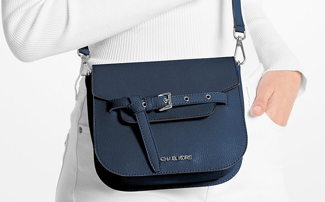 A Person Wearing Michael Kors Emilia Small Pebbled Leather Crossbody Bag