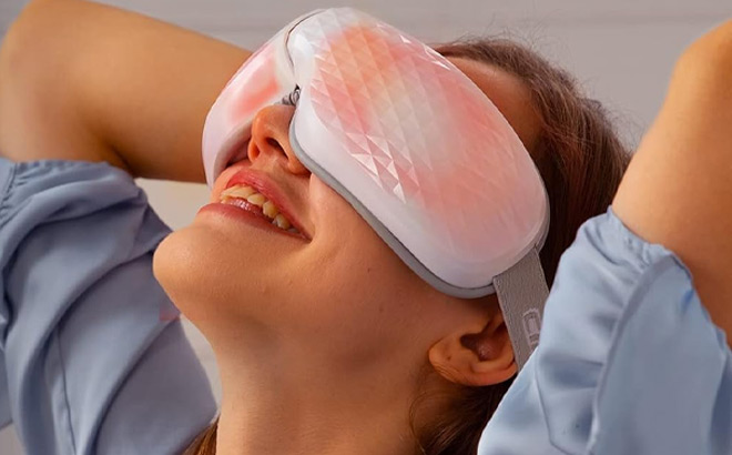 A Person Wearing Relief Migraine Eye Massager