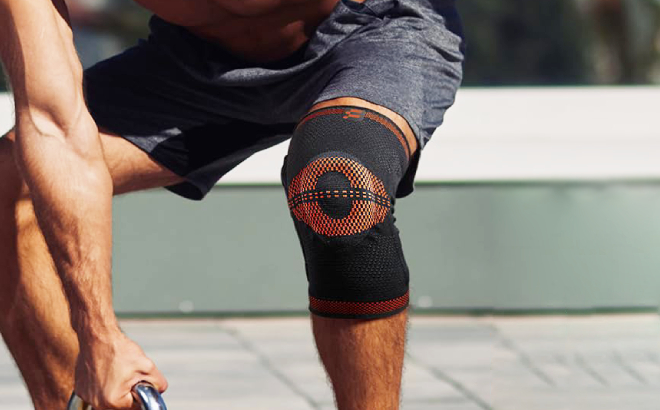 A Person Wearing a Compression Knee Brace