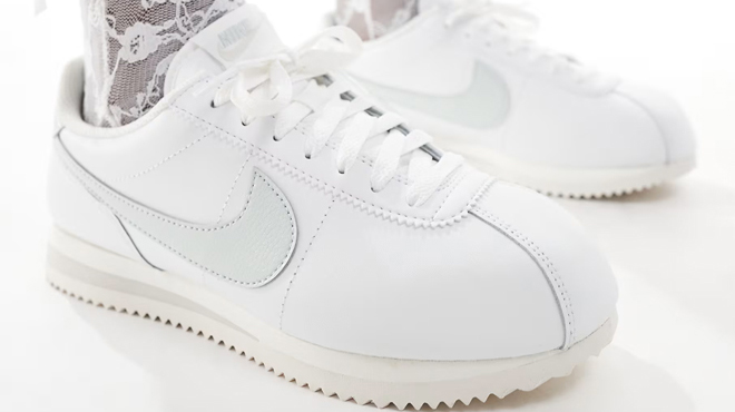 A Person Wearing a Nike Cortez Leather Sneakers