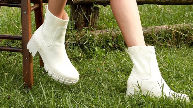 A Person Wearing a White Groupsky Womens Chelsea Boots