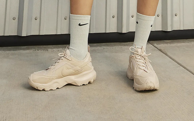 A Person Wearing the Nike TC 7900 Womens Shoes