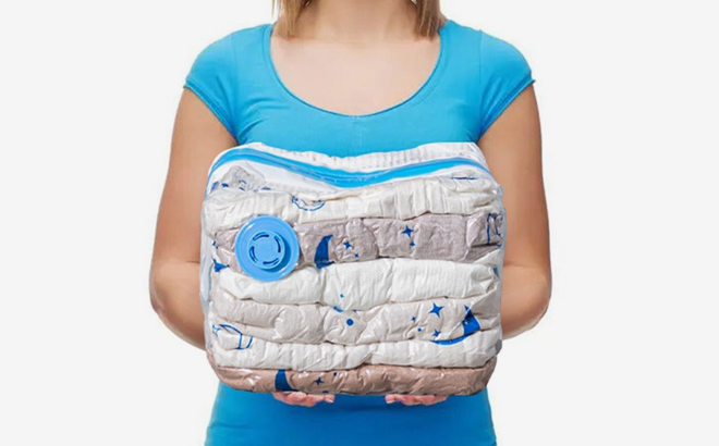 A Person holding a Vacuum Storage Bag