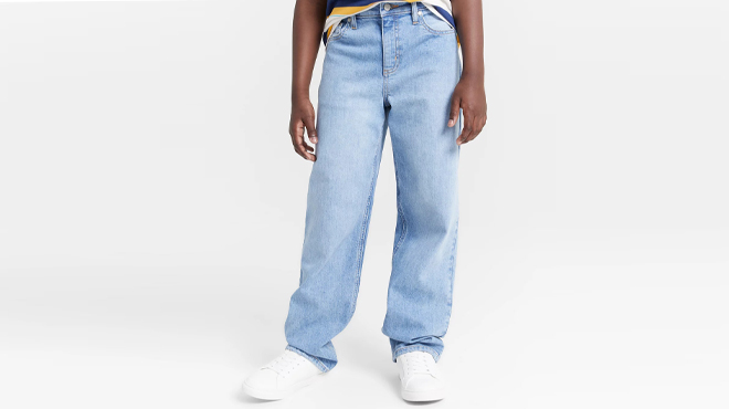 A Person wearing an Epic Threads Relaxed Fit Bigleaf Little and Big Boys Jeans