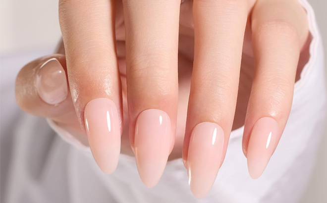 A Woman Having Beetles Gel Almond Shaped Press On Nails