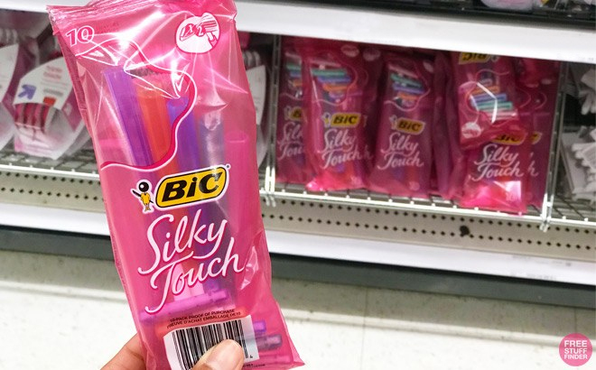 A Woman Holding BIC Silky Touch Disposable Razors 10 Count