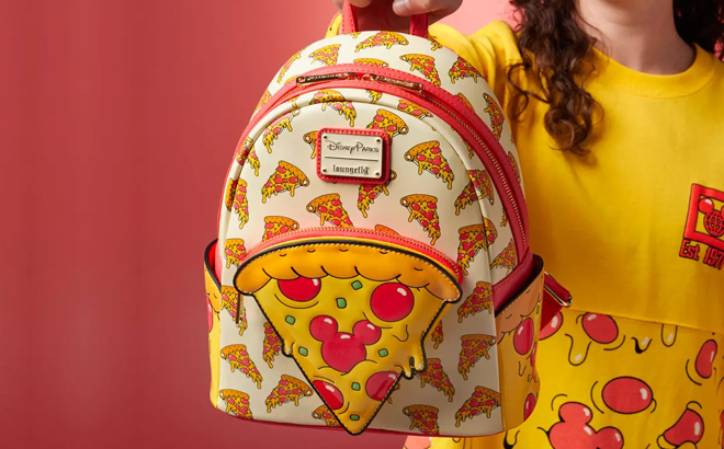 A Woman Holding Disney Eats Mickey Mouse Pizza Loungefly Mini Backpack