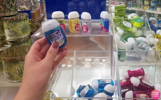 A Woman Holding a PocketBac Hand Sanitizer