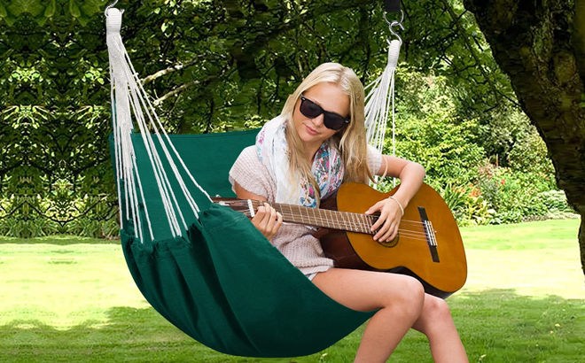 A Woman Sitting in the Livhil Hammock Swing Chair