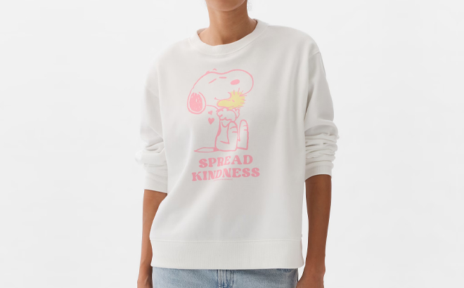 A Woman Wearing GAP Factory Relaxed Peanuts Graphic Sweatshirt