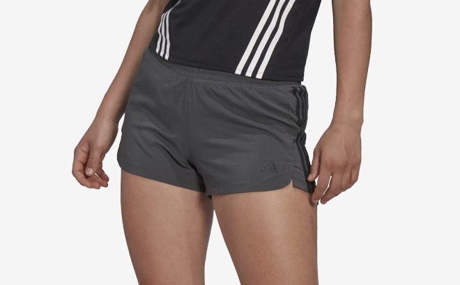 A Woman Wearing Grey Adidas Shorts