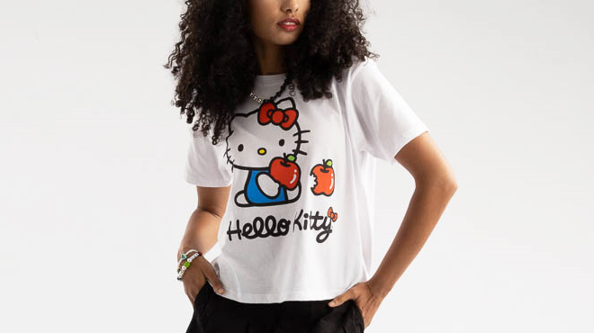 A Woman Wearing Hello Kitty Cropped Tee