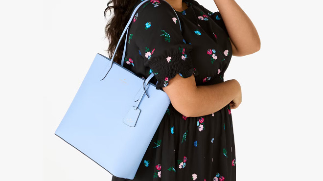 A Woman Wearing Kate Spade Outlet Brynn Tote