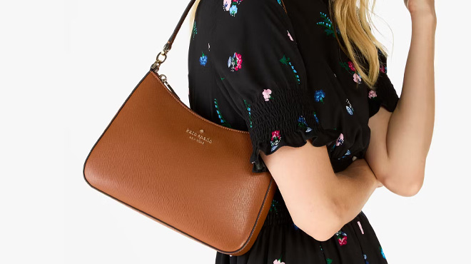 A Woman Wearing Kate Spade Outlet Madison Shoulder Bag