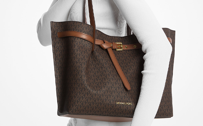 A Woman Wearing Michael Kors Emilia Large Logo Tote Bag