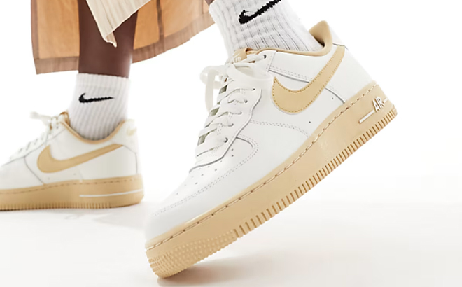 A Woman Wearing Nike Air Force 1 Sneakers