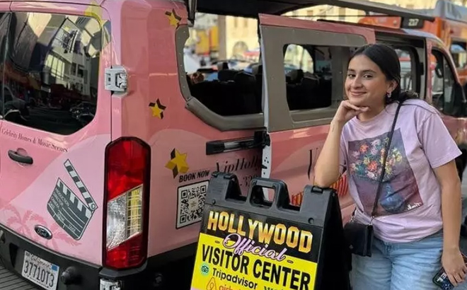 A lady getting ready for an open air Van tour