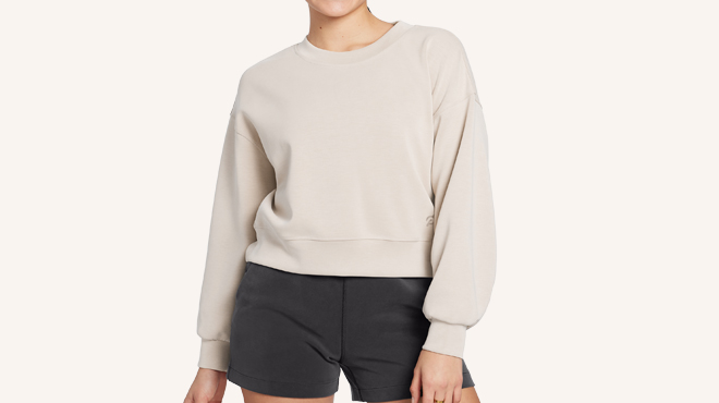 A person Wearing Lululemon x Peloton Softstreme Perfectly Oversized Cropped Crew