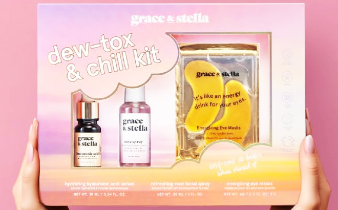 A person holding a box of Grace Stella Skin Care Set