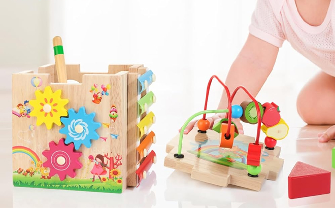 Baby Playing with the Bravmate Wooden Activity Cube