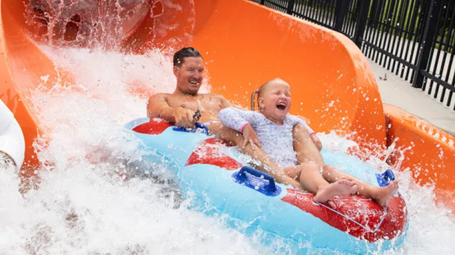 Dad and Daughter on a Myrtle Waves Water Park Sljde