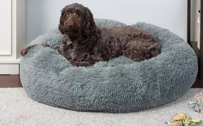 FurHaven Calming Cuddler Long Fur Donut Dog Bed in the Color Taupe