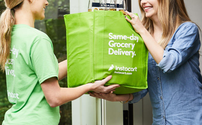 Instacart Shopper Delivering Groceries to a Smiling Woman