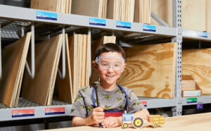 Kid at the Lowes Harvest Hayride Workshop