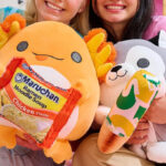 Kids Holding Snackle Plushies