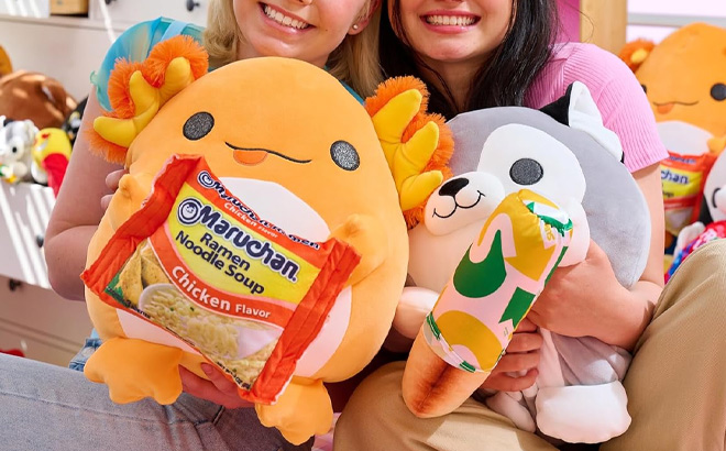 Kids Holding Snackle Plushies