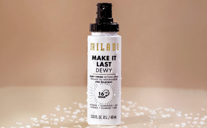 Milani Make It Last Dewy Finish Setting Spray on the Table