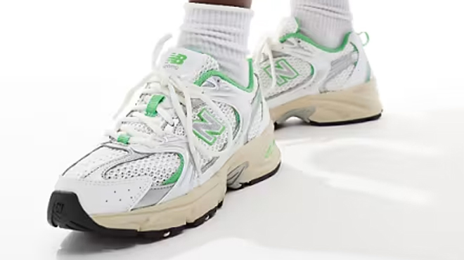 New Balance 530 sneakers in white and green