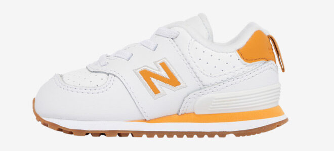 New Balance 574 Boys Toddler Shoe in White and Orange Color