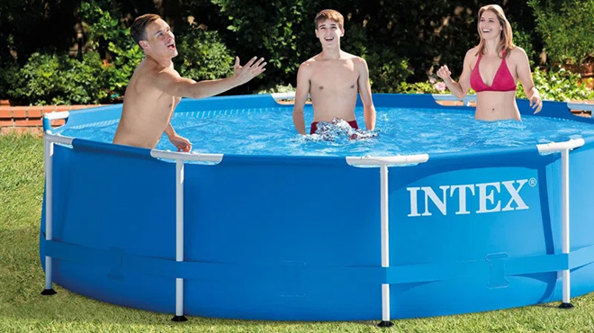 People dipping on a Intex 10ft x 30 in Metal Frame Swimming Pool Set