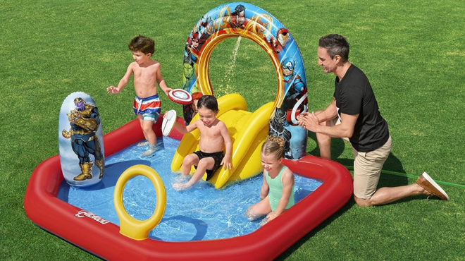 People playing in Bestway Marvels Avengers Assemble Kids Inflatable Water Play Center