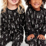 People wearing Old Navy Halloween Kids Pajamas