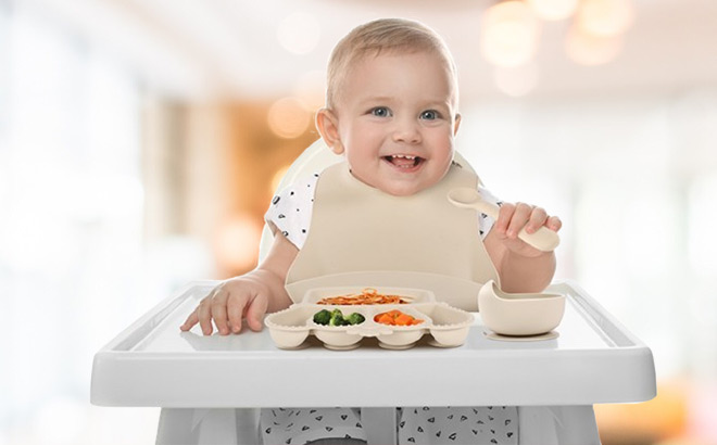 Silicone Baby Feeding Set on the Baby and Table