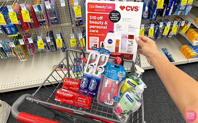 Softsoap Hand Soaps Oral B Toothbrushes Colgate Toothpastes Gillette Venus Sensitive Disposable Razor and a Flyer in a Cart at CVS Beauty