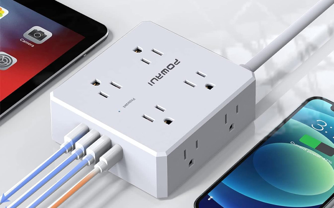 Surge Protector Power Strip and an iPhone on a Table