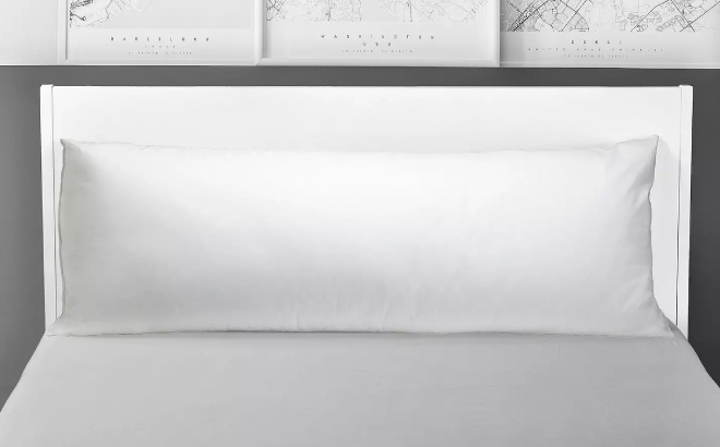 The Big One Body Pillow on a Bed