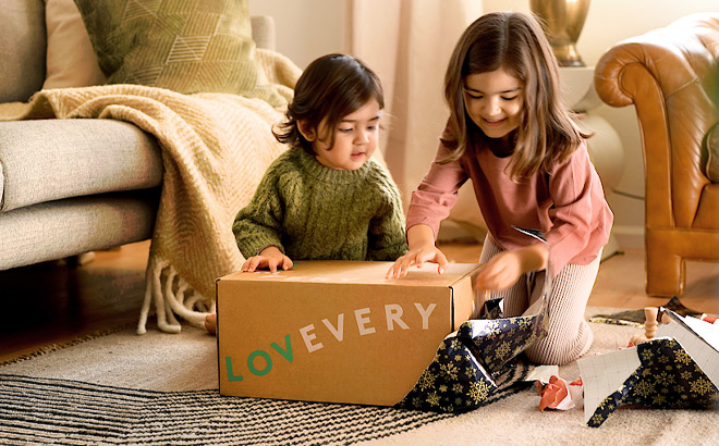 Two Kids Opening a Box